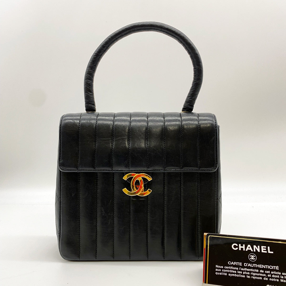 CHANEL Matelasse Mademoiselle Coco Mark Lambskin Handbag Reference Number: 2373