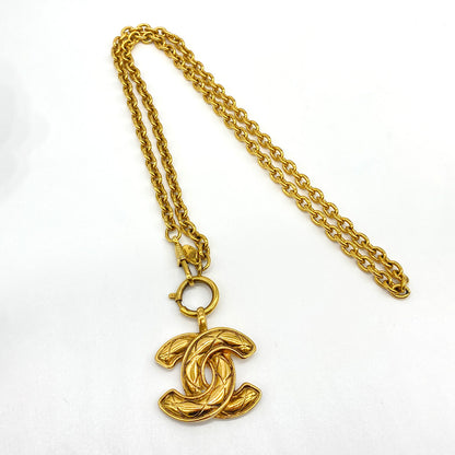 CHANEL Vintage Matelasse Coco Mark Pendant Reference Number: 2377