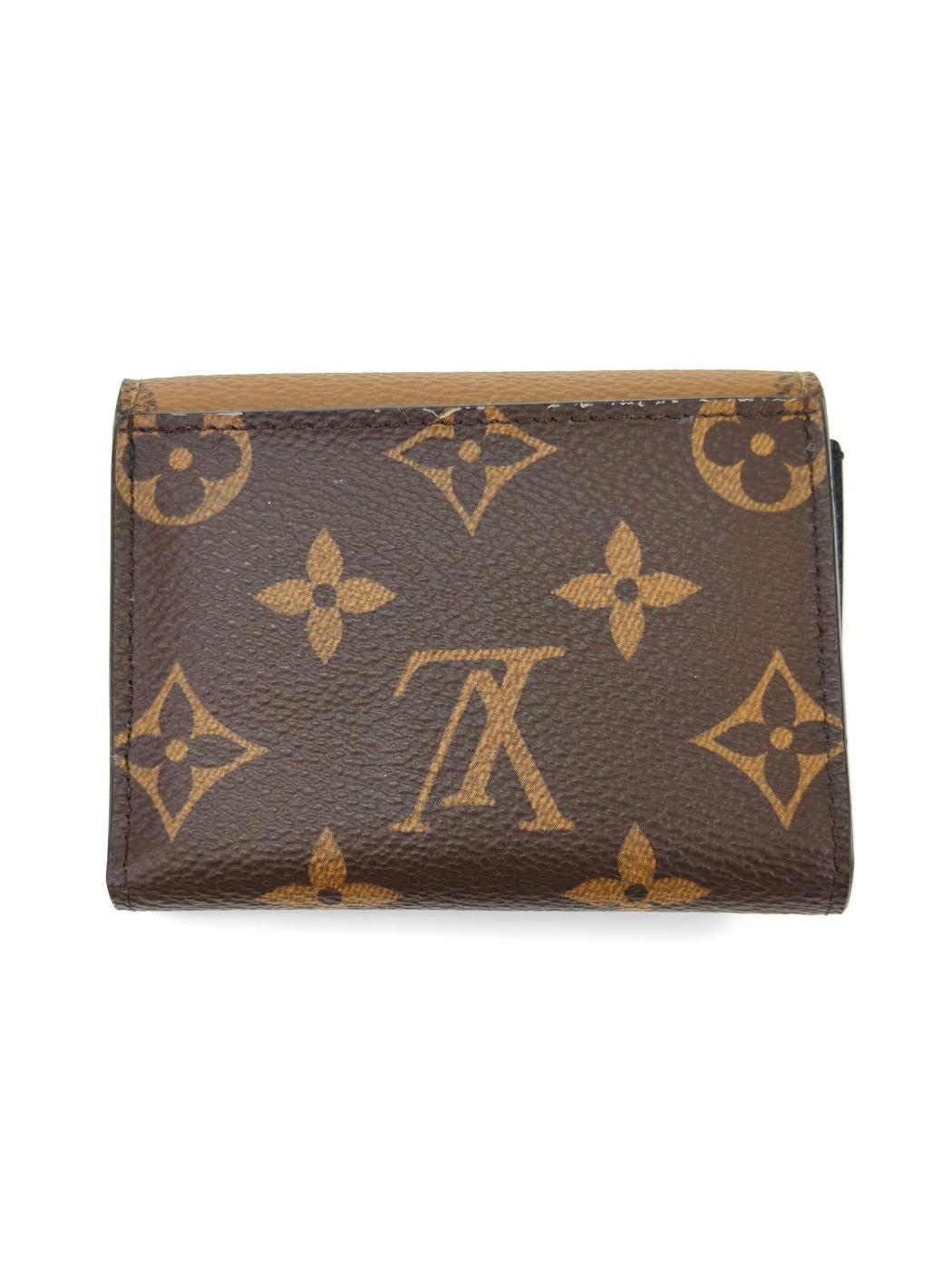 LOUIS VUITTON Portefeuille Zoe Trifold Wallet Monogram Brown Model Number: 10575