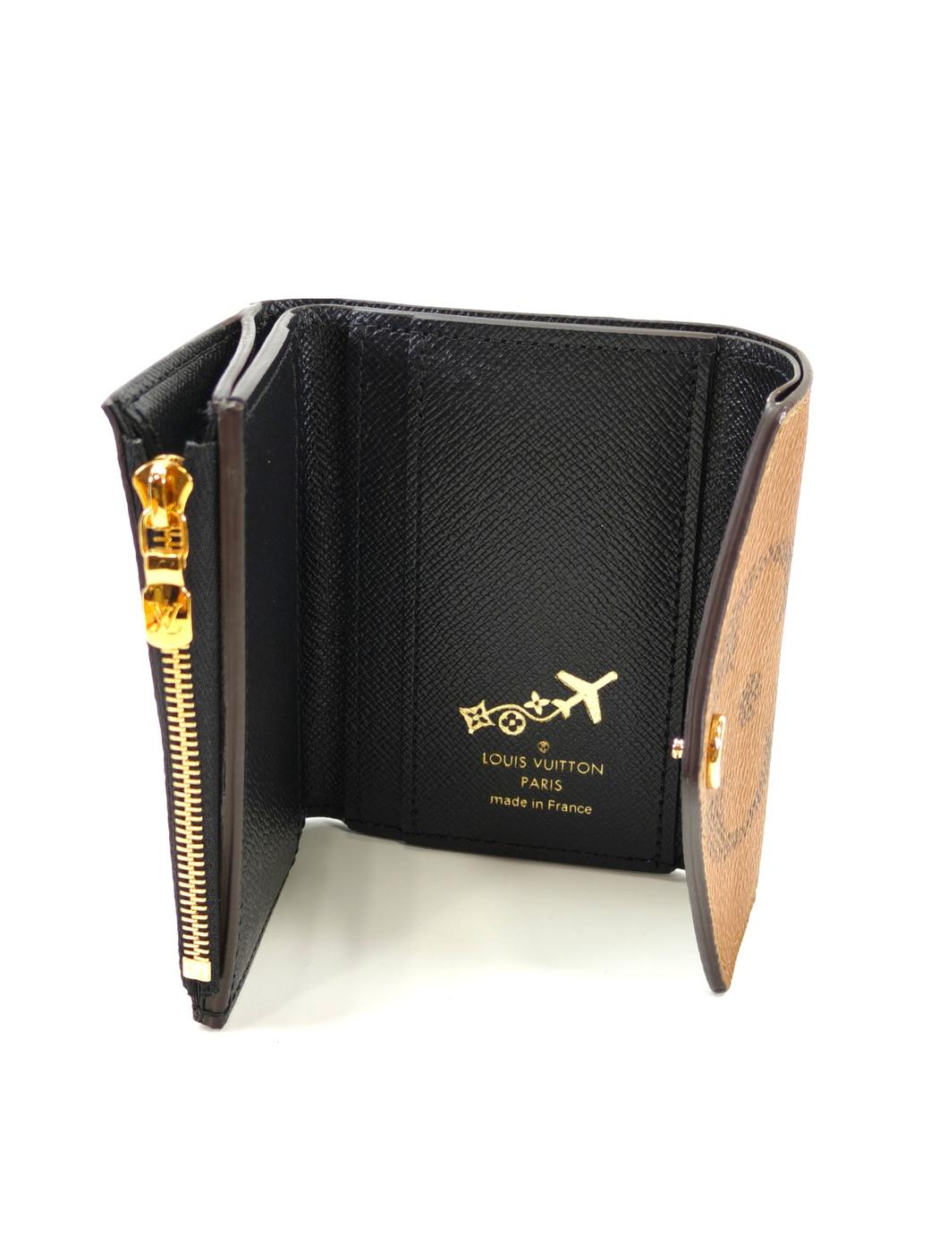LOUIS VUITTON Portefeuille Zoe Trifold Wallet Monogram Brown Model Number: 10575
