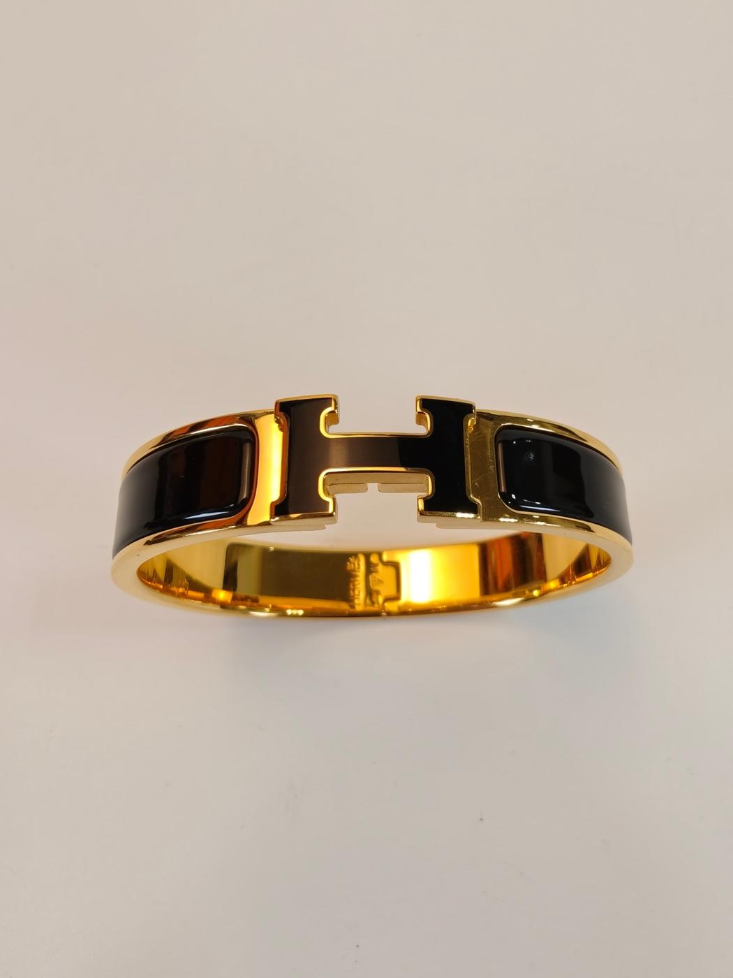 爱马仕 Click H PM 手镯，金色和黑色，参考编号：10509