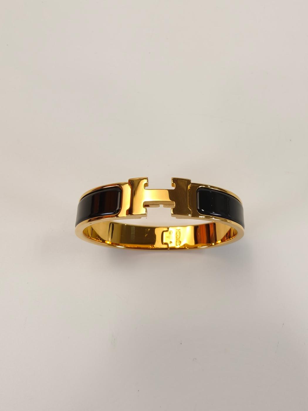 爱马仕 Click H PM 手镯，金色和黑色，参考编号：10511