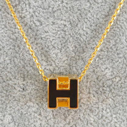 HERMES エルメス カージュドアッシュ Hキューブ ネックレス ゴールド×ブラック 管理番号：11159