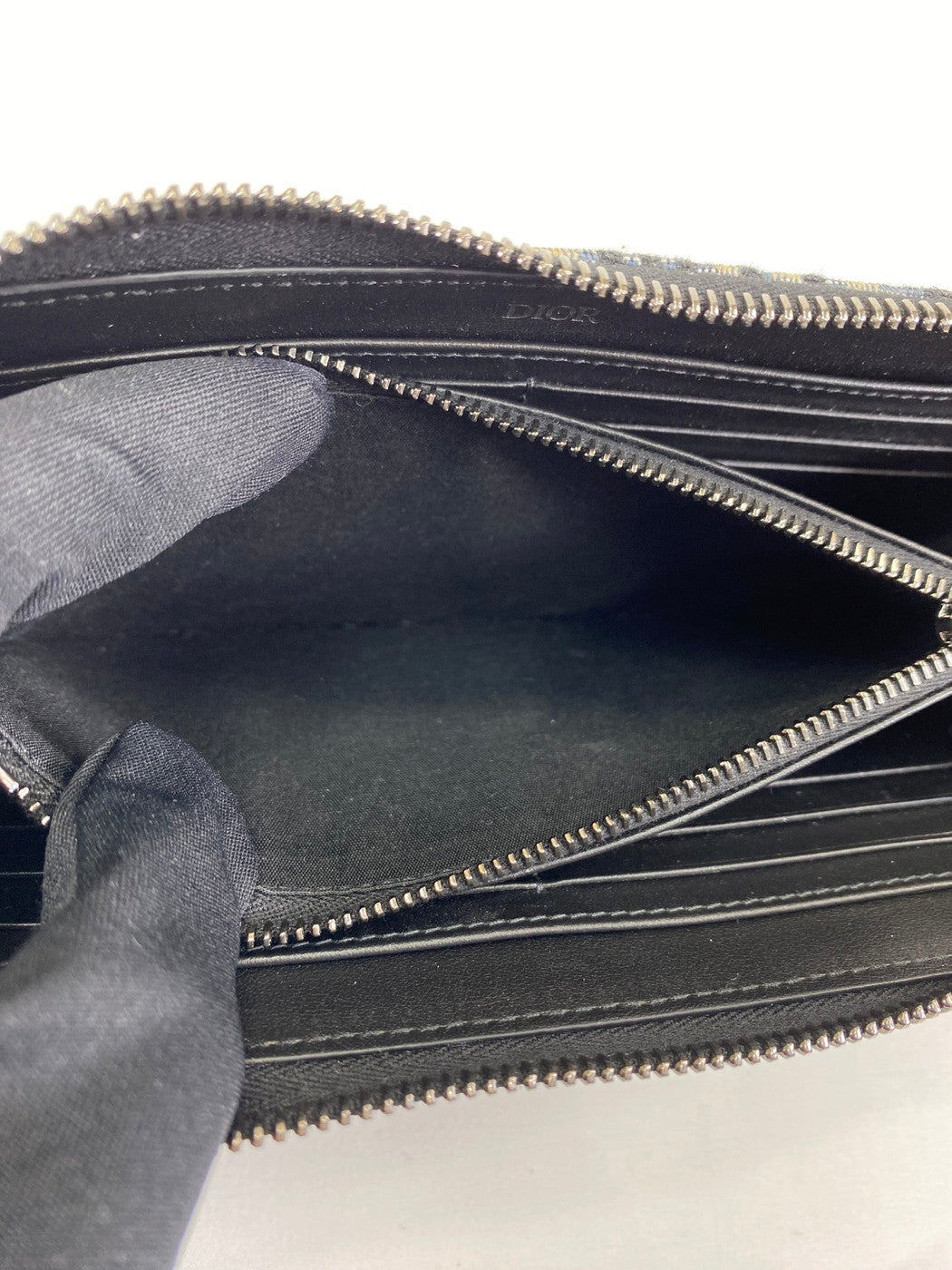 Christian Dior Trotter Oblique 提花拉链长款钱包，海军蓝帆布和皮革材质（产品代码：2ESBC252YSE）