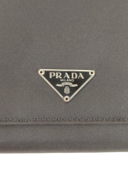 PRADA プラダ 三角ロゴ付き 二つ折り長財布 ブラック 管理番号：11546