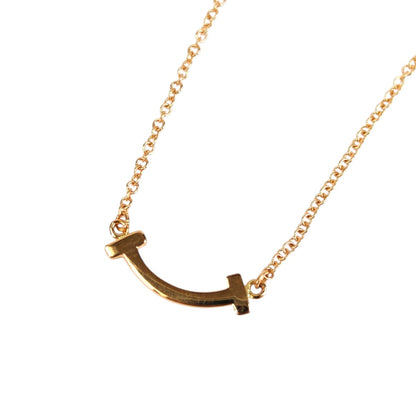 TIFFANY & Co. Tiffany T Smile Pendant Mini Necklace Gold Model Number: 11319