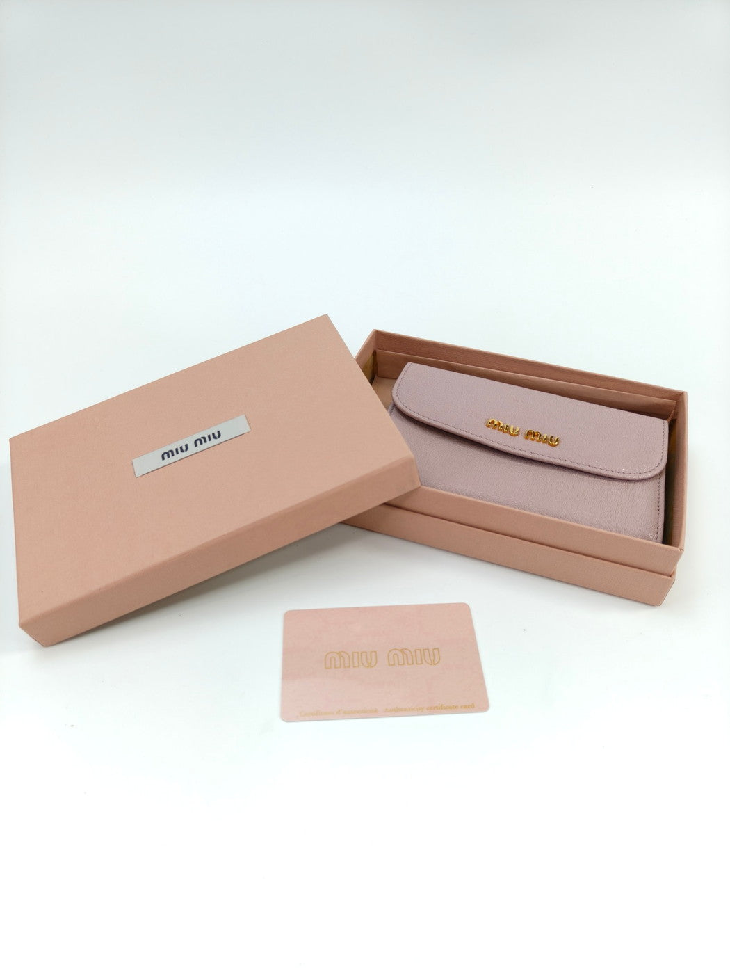 MIUMIU Miu Miu 三折钱包 马德拉斯粉色 控制编号：10148